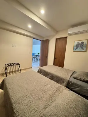 Cama o camas de una habitación en Apartamento con vista al mar y río, albercas, gym, facturamos