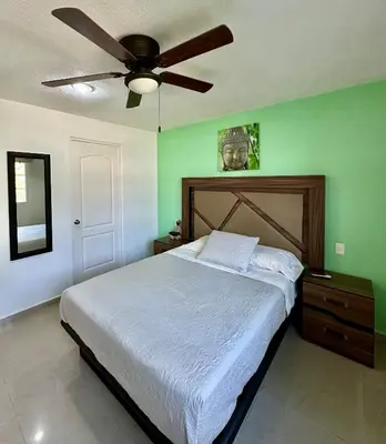Cama o camas de una habitación en PARAISO ESCONDIDO e126