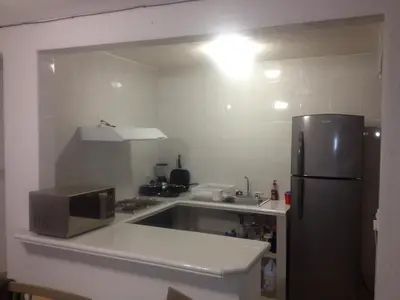 Una cocina o zona de cocina en DEEP OCEAN Zona Diamante Acapulco