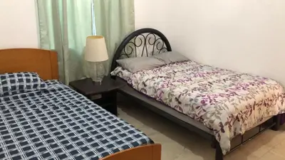 Cama o camas de una habitación en Casa fraccionamiento colonos Ticuman