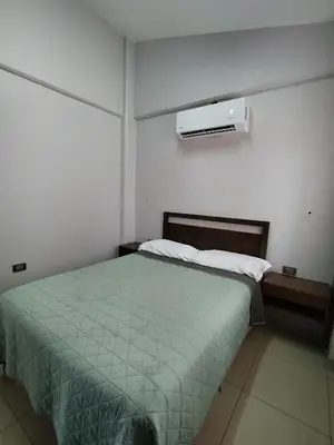 Cama o camas de una habitación en La colina