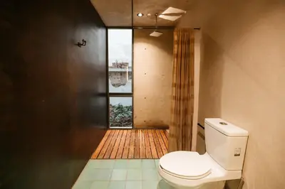 Un baño de Becino