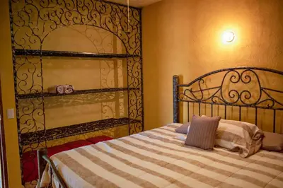 Cama o camas de una habitación en Escápate a una quinta con alberca, asador y diversión en familia