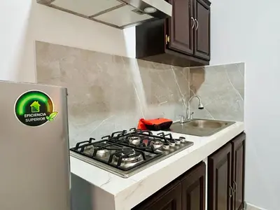 Una cocina o zona de cocina en Departamentos Doña Angela