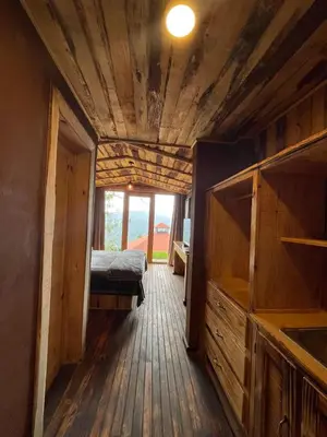 Cama o camas de una habitación en Hotel Boutique y Cabañas Alto de la Sierra