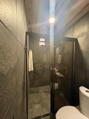 Un baño de Hotel Boutique y Cabañas Alto de la Sierra