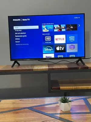 Una televisión o centro de entretenimiento en Villas de Bravo