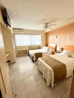 Cama o camas de una habitación en Apartment in Acapulco in the heart of the bay