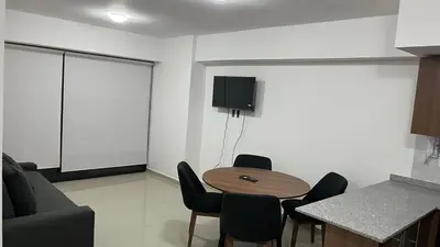 Una televisión o centro de entretenimiento en Departamento en Residencial