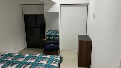 Cama o camas de una habitación en Departamento en Residencial