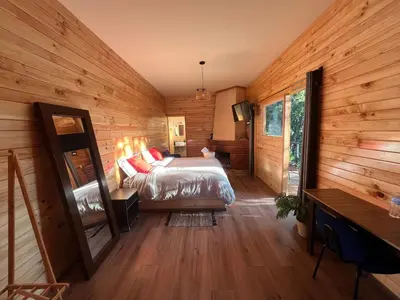 Cama o camas de una habitación en San José del Pacífico- Cabañas Camino al Cielo 1