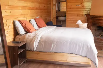 Cama o camas de una habitación en San José del Pacífico- Cabañas Camino al Cielo 1