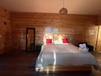 Cama o camas de una habitación en San José del Pacífico- Cabañas Camino al Cielo 1
