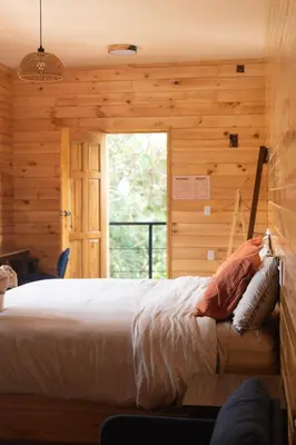 Cama o camas de una habitación en San José del Pacífico- Cabañas Camino al Cielo 1