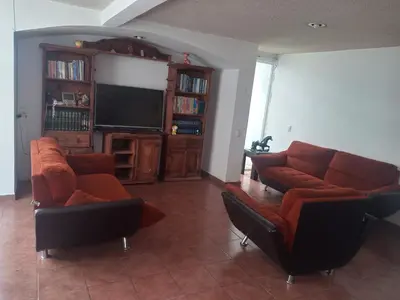 Zona de estar de Casa familiar cerca del Centro