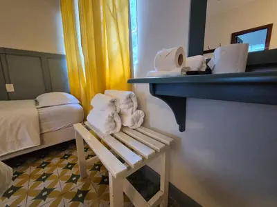 Cama o camas de una habitación en Hotel Posada Doña Carito