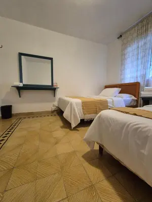Cama o camas de una habitación en Hotel Posada Doña Carito