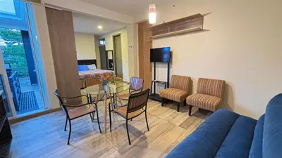 Una televisión o centro de entretenimiento en Loft Huamuche San Sebastián Tutla