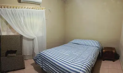 Cama o camas de una habitación en Comfortable apartment, close to the beach