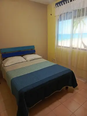 Cama o camas de una habitación en Comfortable apartment, close to the beach