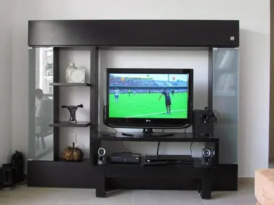 Una televisión o centro de entretenimiento en Departamento Paraiso Country Club-Morelos