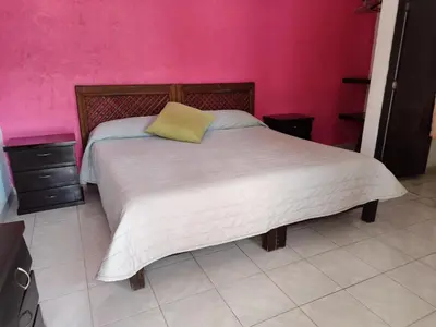 Cama o camas de una habitación en Hotel Villas Cuernavaca