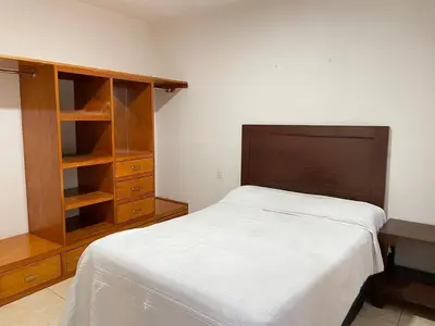 Cama o camas de una habitación en O Vibes