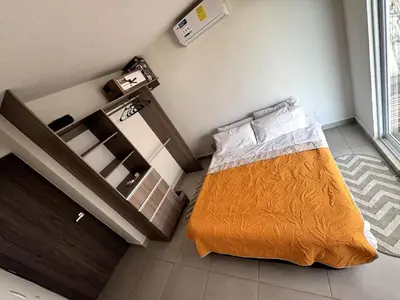 Cama o camas de una habitación en Departamento P B con Club de Playa Zona Diamante
