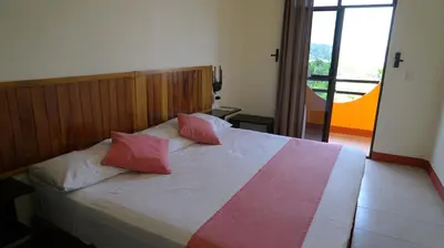 Cama o camas de una habitación en Bacanda Hotel