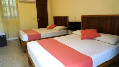 Cama o camas de una habitación en Bacanda Hotel