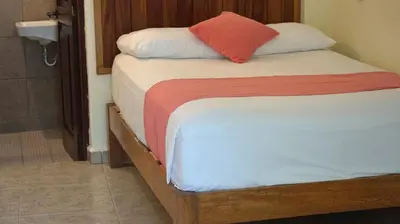 Cama o camas de una habitación en Bacanda Hotel