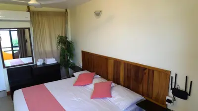 Cama o camas de una habitación en Bacanda Hotel