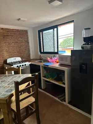 Una cocina o zona de cocina en Beatiful aparment in the magical town of Orizaba 3