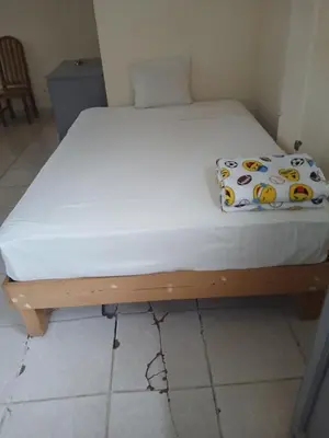 Cama o camas de una habitación en Hotel Aguila Real
