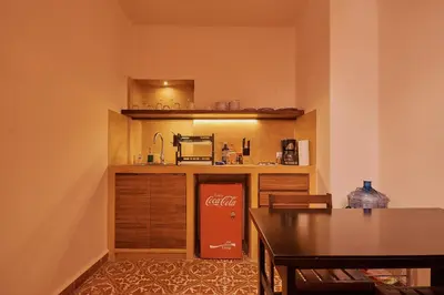 Una cocina o zona de cocina en MANGO AC Location Design