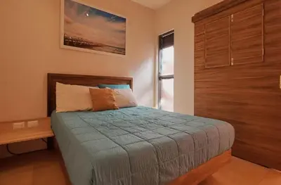 Cama o camas de una habitación en MANGO AC Location Design