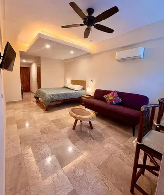 Una televisión o centro de entretenimiento en Casa del Sol