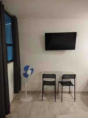 Una televisión o centro de entretenimiento en Palacio de los Angeles