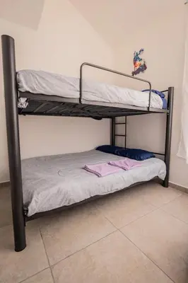 Cama o camas de una habitación en Family House with Water Park Tlayecac, 3 Bedrooms