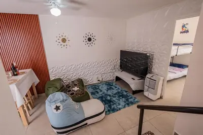 Una televisión o centro de entretenimiento en Family House with Water Park Tlayecac, 3 Bedrooms