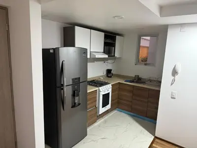 Una cocina o zona de cocina en Cozy apartment, all amenities