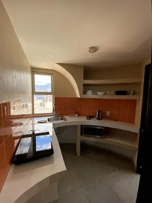 Una cocina o zona de cocina en Departamento Gudelia
