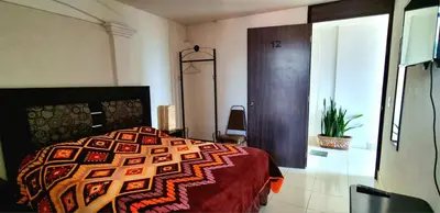Cama o camas de una habitación en Hotel El Eden 2 pers 12