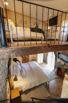 Cama o camas de una habitación en Loft Rafael en ValQuirico