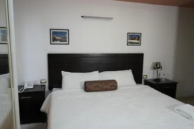 Cama o camas de una habitación en Rolovi Hotel Xalapa Centro
