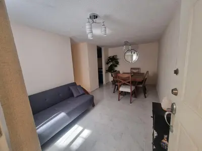 Zona de estar de El depa de Natalia a min de aeropuerto y estadio GNP