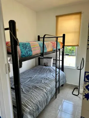 Cama o camas de una habitación en Room in modern apartment with garden
