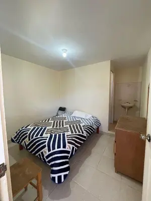 Cama o camas de una habitación en Hotel Aguila Real