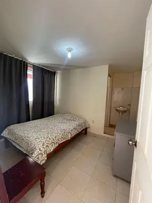 Cama o camas de una habitación en Hotel Aguila Real