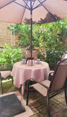 Jardín al aire libre en Casa Rosa Paradise